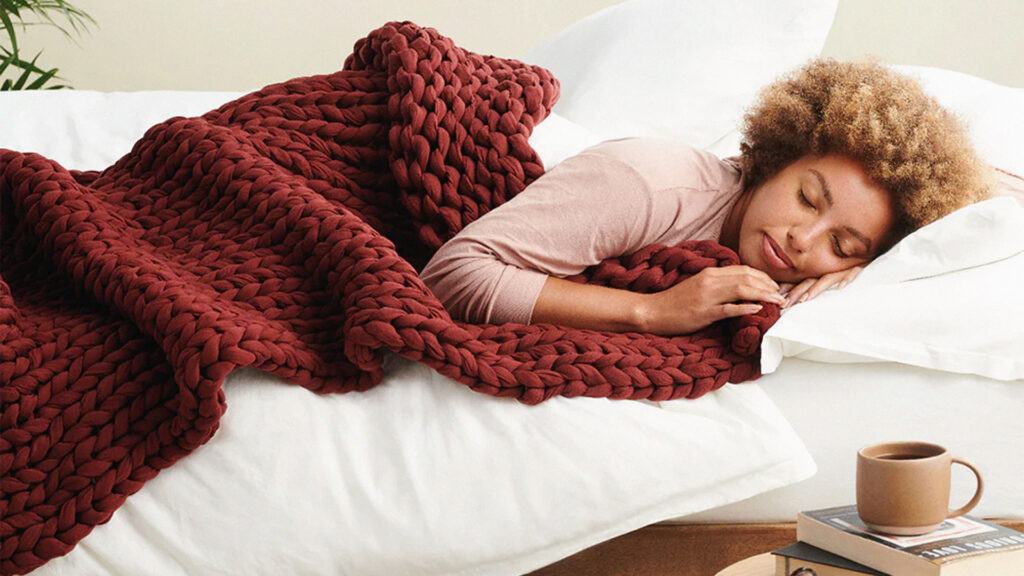 Woman sleeping weighted blanket for adults with anxiety 
